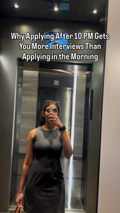Frame at 2 seconds: The creator walks closer to the mirror while the headline remains unchanged.