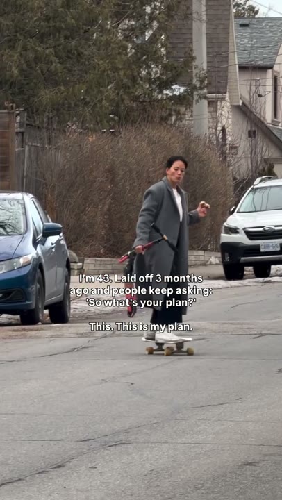 Frame at 2 seconds: The layoff-and-plan overlay appears immediately as the creator rides toward the camera with a scooter and food.