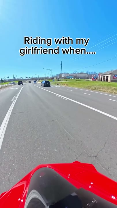 Frame at 1 seconds: Moving road POV carries the unfinished setup, 'Riding with my girlfriend when....'