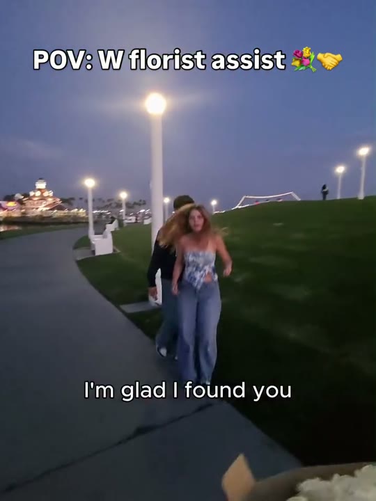 Frame at 1 seconds: The creator calls out to the approaching people: 'yo bro' and 'I'm glad I found you,' beneath the florist-assist…
