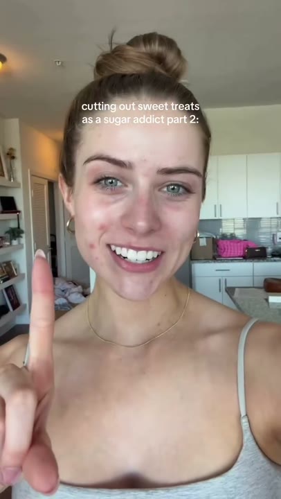Frame at 1 seconds: Introduce the challenge with a cheerful day-one selfie, immediately advance to day two, and cut to the creator curled…