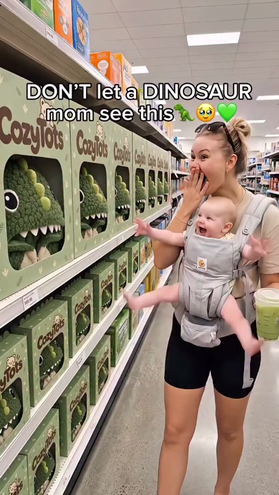 Frame at 0 seconds: The niche warning appears above the creator's hand-over-mouth reaction beside a dinosaur product display.